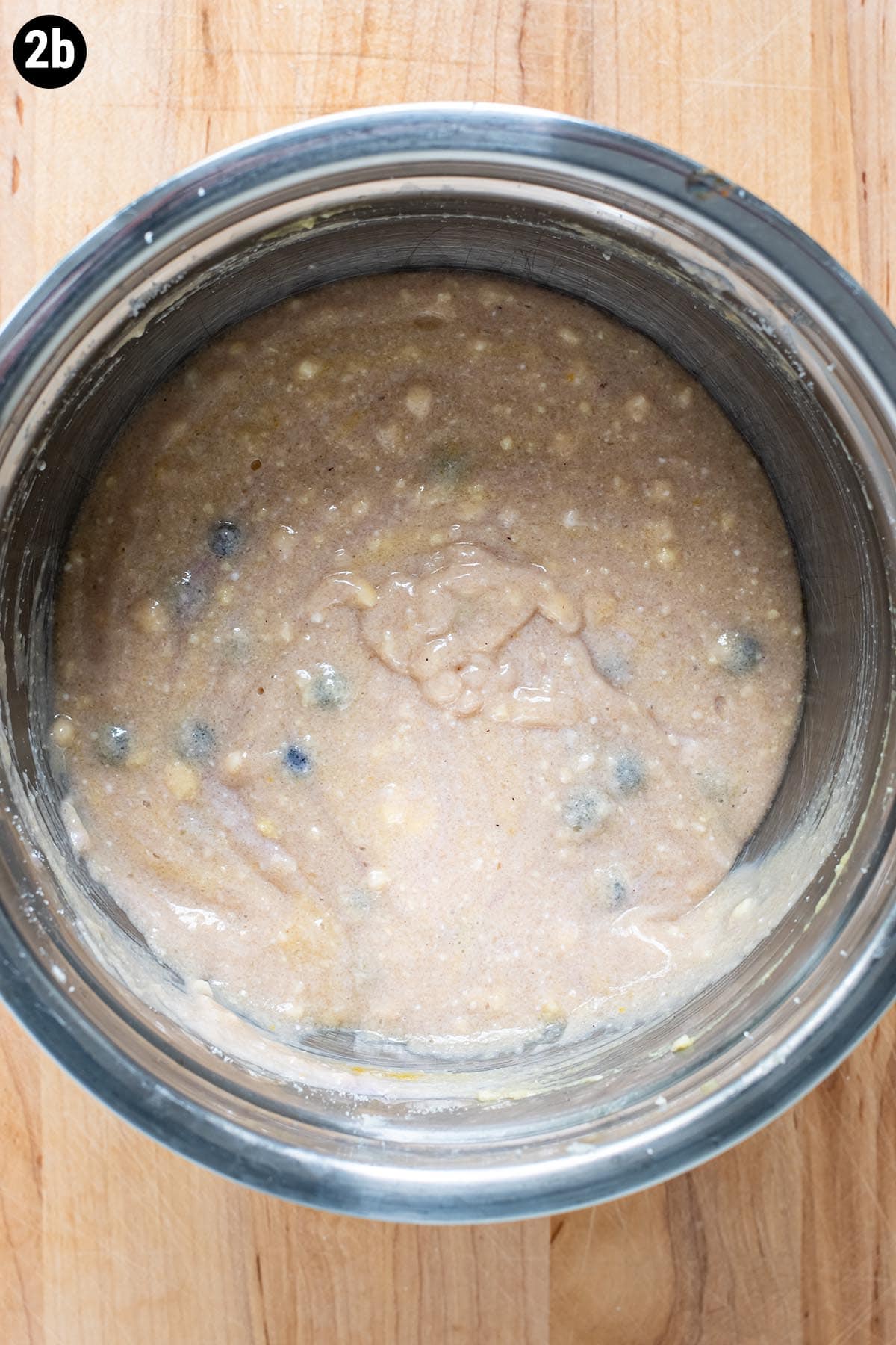 Blueberry muffin batter made with eggs, sugar, butter, and blueberry Greek yogurt.
