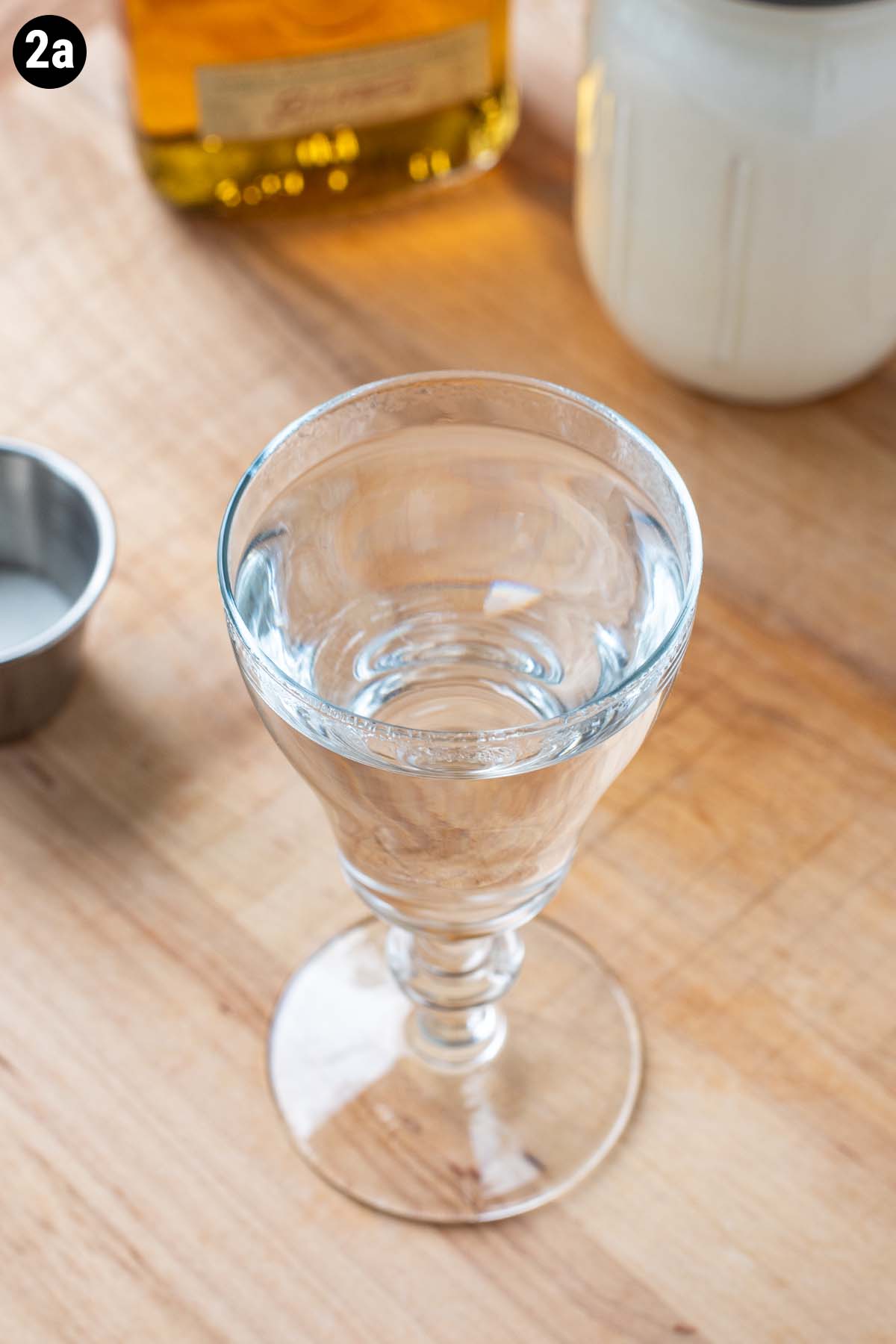 Hot water in a glass Irish Coffee glass.