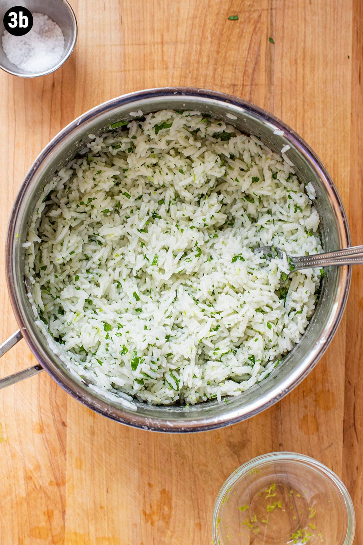 Finished cilantro lime rice in a saucepan.
