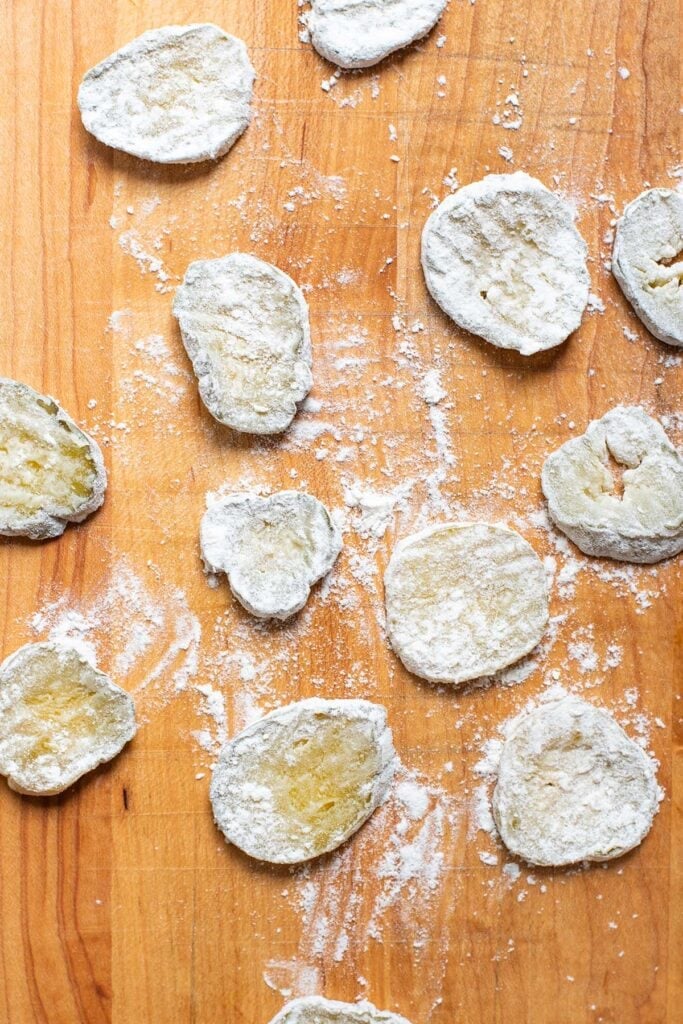 Dill pickles dredged in a light coating of all-purpose flour.