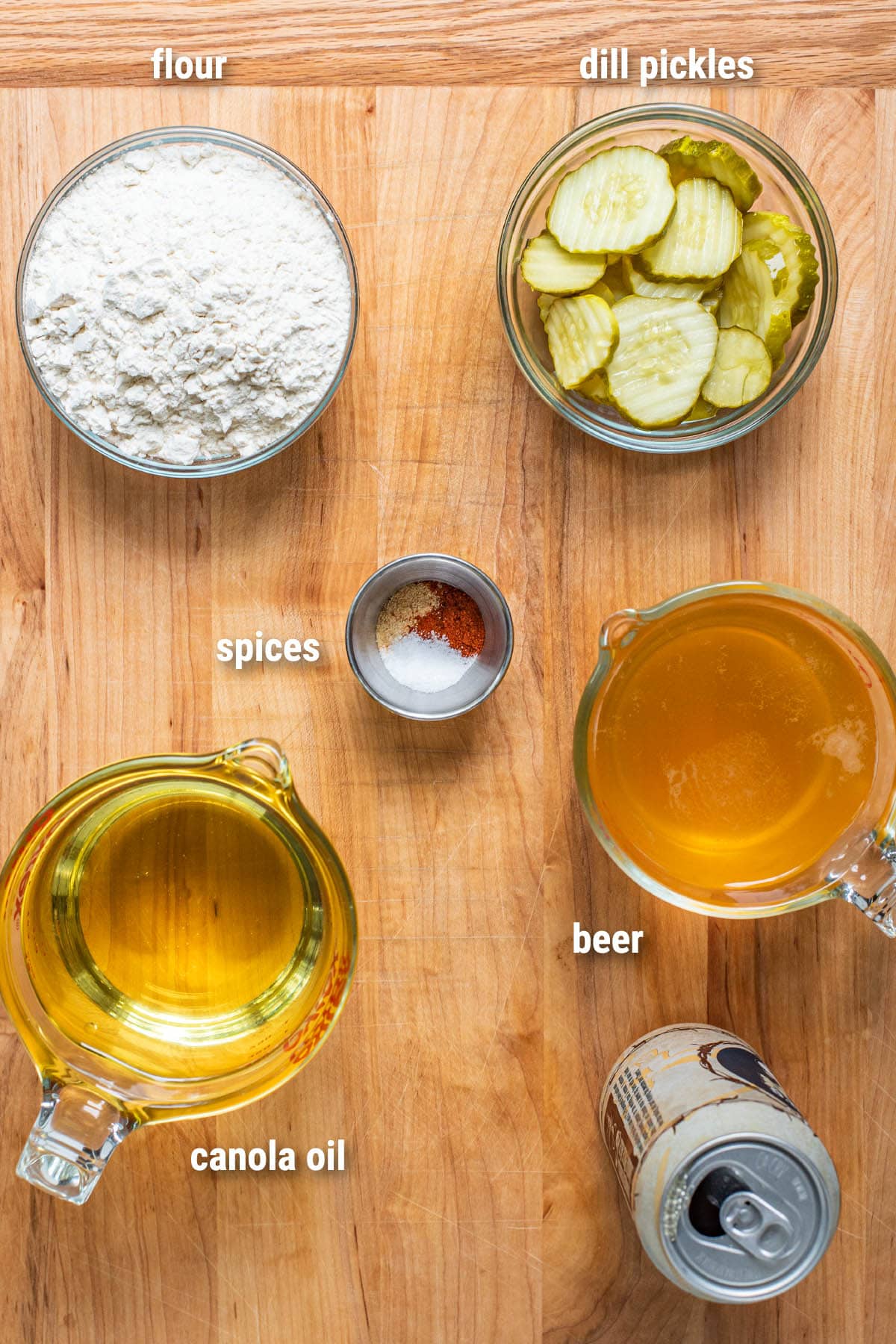 Fried pickles ingredients on a cutting board.